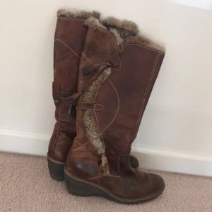 Brown Nine West boots with faux fur